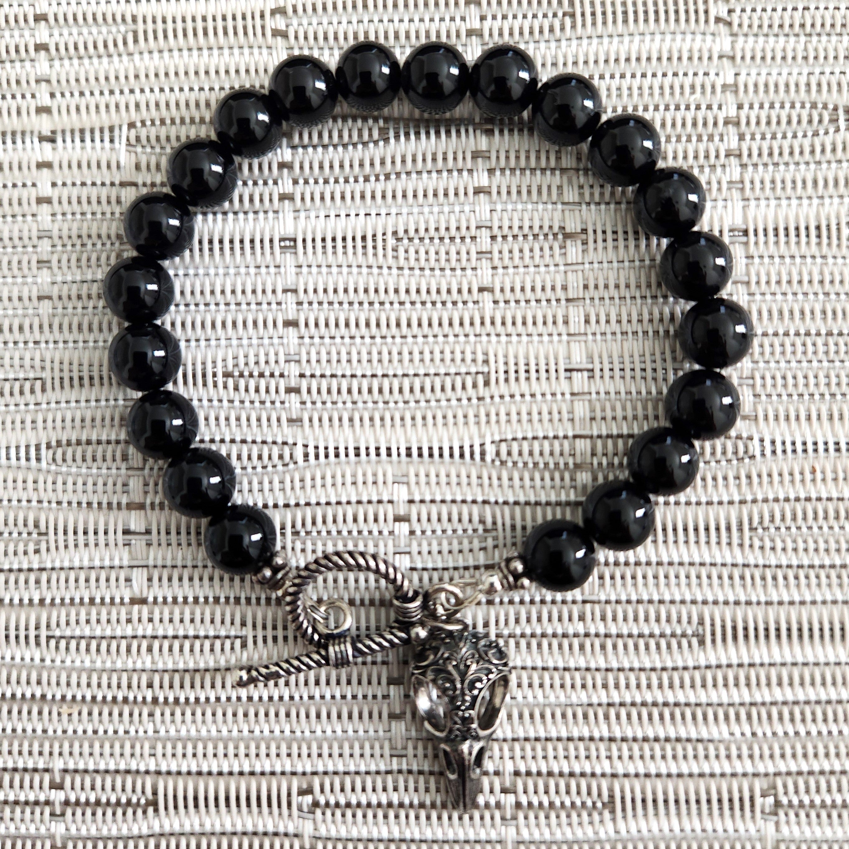 Y--BLACK ONYX BRACELET WITH RAVEN CHARM