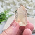 Natural pale honey Citrine point from Brazil with phantom inclusions. A unique crystal for manifestation, clarity, energy work, and spiritual growth.