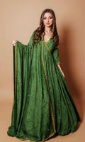 Emerald green silk anarkali gown with tonal floral embroidery, gold cutdana, stones, and sequins.