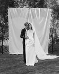 Barbara Palvin-Sprouse's 3 different bridal looks during her Hungarian wedding to Dylan Sprouse in 2023: custom Vivienne Westwood gown, a Philosophy di Lorenzo Serafini midi dress and finally a red dress by