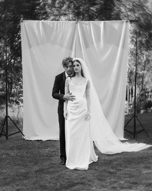 Barbara Palvin-Sprouse's 3 different bridal looks during her Hungarian wedding to Dylan Sprouse in 2023: custom Vivienne Westwood gown, a Philosophy di Lorenzo Serafini midi dress and finally a red dress by