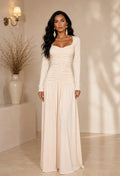 Vestido longo Aura da Dress Eleven em areia, vista das costas.